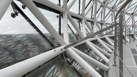 Futuristic interior structure of the Lithuanian Museum of Ethnocosmology, featuring geometric metal framing and glass panels in a domed observatory design. - Powered by Shutterstock - Get 15% off with code: PIKWIZARD15