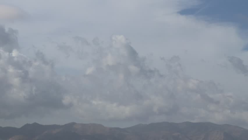 TIMELAPSE OF CLOUDS WITH MONTAINS. SPAIN. 