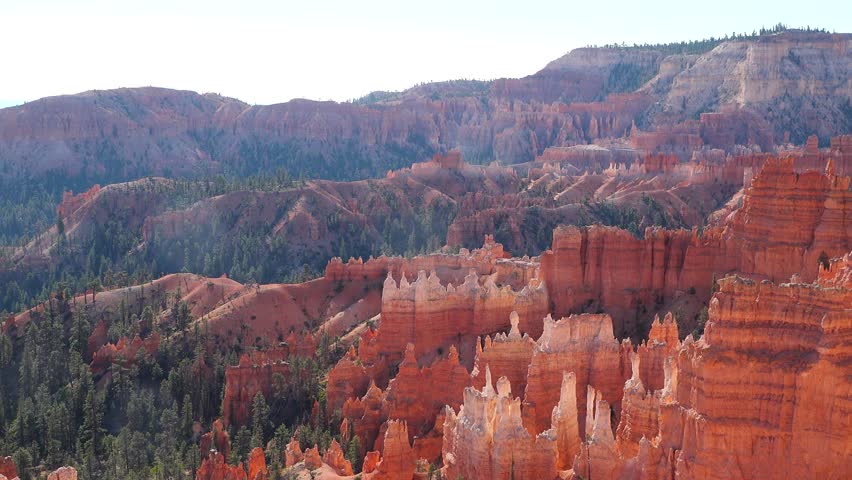 Rock formations and vibrant colors of Bryce Canyon National Park in bright daylight