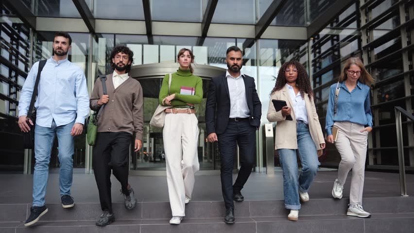 Business Team People walking together after work, with confidence and determination - Group of successful company professionals in the city 