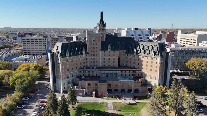 Autumn aerial video of Saskatoon’s Central Business District highlighting golden trees and city architecture in 4K.