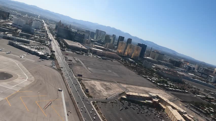 Flying over nevada California desert landscape skyline space airplane vacation Las Vegas strip view 