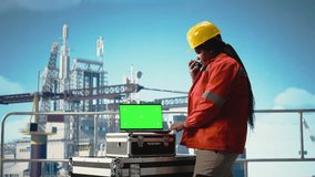 Green screen laptop used by drilling rig worker using handheld radio device to monitor systems. Offshore platform employee using walkie talkie, calibrating equipment with mockup notebook, camera A - Powered by Shutterstock - Get 15% off with code: PIKWIZARD15