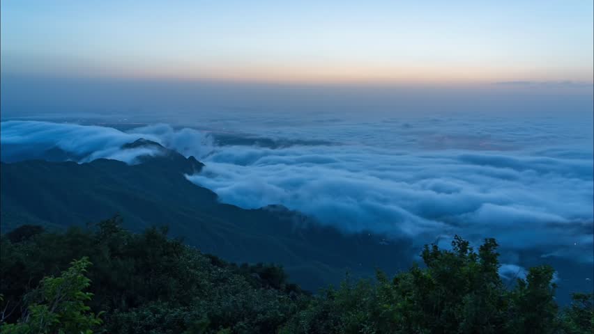 Beijing, China - 10th August 2024 - Overlooking sea of clouds on mountaintop of Beijing Mount Miaofeng at sunrise