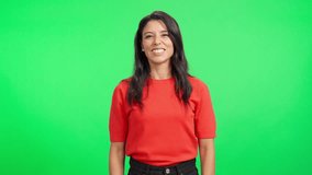 Beautiful hispanic woman blowing kisses on a green screen - Powered by Shutterstock - Get 15% off with code: PIKWIZARD15
