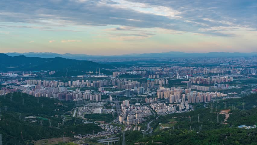 Beijing, China - 5th September 2024 - Overlooking Bejing cityscape Mentougou district day to night