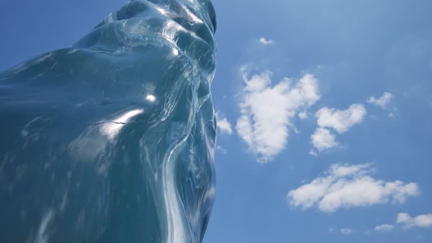 Majestic frozen pillar on blue cloudy sky nature bg 4k. 3D Illustration