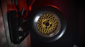 old retro stylish collapsible two-component wheels with a gold center and shiny rims for car tuning vertical video - Powered by Shutterstock - Get 15% off with code: PIKWIZARD15