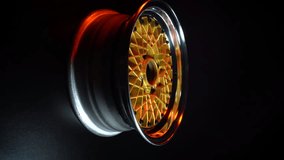 old retro stylish collapsible two-component wheels with a gold center and shiny rims for car tuning vertical video - Powered by Shutterstock - Get 15% off with code: PIKWIZARD15