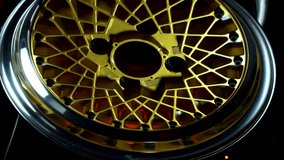 old retro stylish collapsible two-component wheels with a gold center and shiny rims for car tuning vertical video - Powered by Shutterstock - Get 15% off with code: PIKWIZARD15