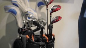 Luxury golf clubs shine in upscale pro shop, showcasing professional-grade equipment. Clubs await enthusiasts looking for the best gear to enhance their game. - Powered by Shutterstock - Get 15% off with code: PIKWIZARD15