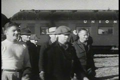 1940s - Volunteers in Utah contribute to the war effort in 1943 by unloading and loading freight trains.