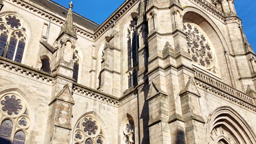Panning Upward View of the Basilica of Saint-Aubin Notre-Dame de Bonne-Nouvelle in Rennes square Saint-Anne