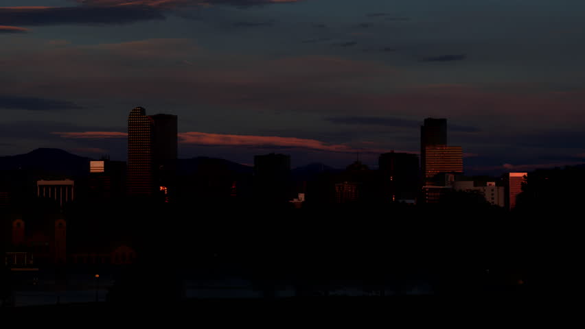 Downtown Denver Skyline at Sunrise Time Lapse Pan Left