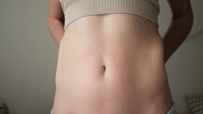 Caucasian woman makes hand massage using moisturizing cream. Manual massage technique. Self care spa procedure at home. Morning ritual.