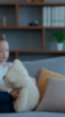 Happy Caucasian family relocation buying new home couple parents hands holding keys daughter child kid playing on background custody adoption insurance mortgage loan concept credit bank moving day