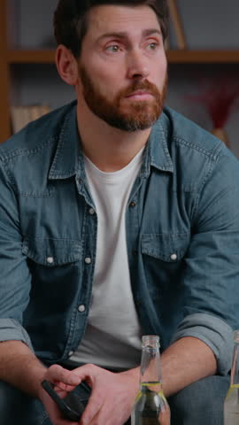 Caucasian middle-aged frustrated disappointed man at home party canceled with pizza chips stress alone lonely male guy on couch suffering without no friends birthday loneliness isolation quarantine