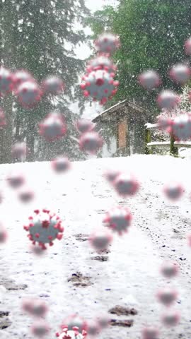 Animation of covid 19 cells moving over winter scenery with snow covered landscape and snow falling in the background. christmas time during covid 19 coronavirus pandemic concept digitally generated