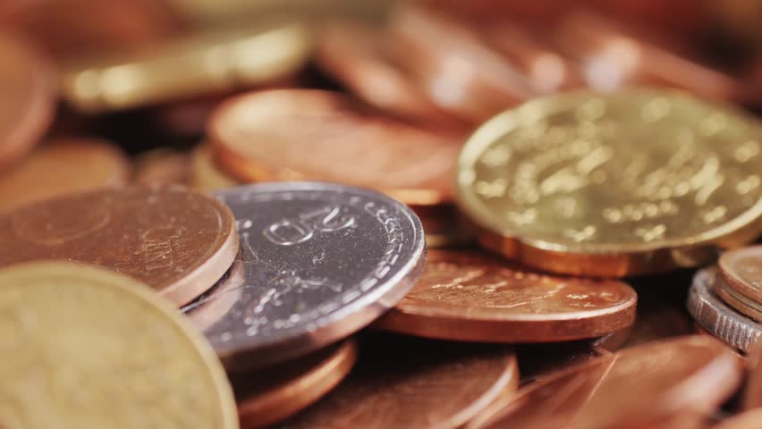 Coins background, euro coins. cent coins, counting euro cents