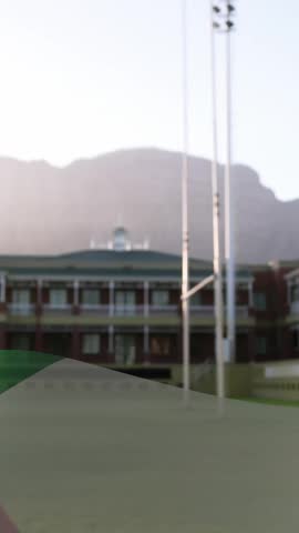 Animation of flag of italy over diverse rugby players playing rugby. Sport, patriotism and digital interface concept digitally generated video.