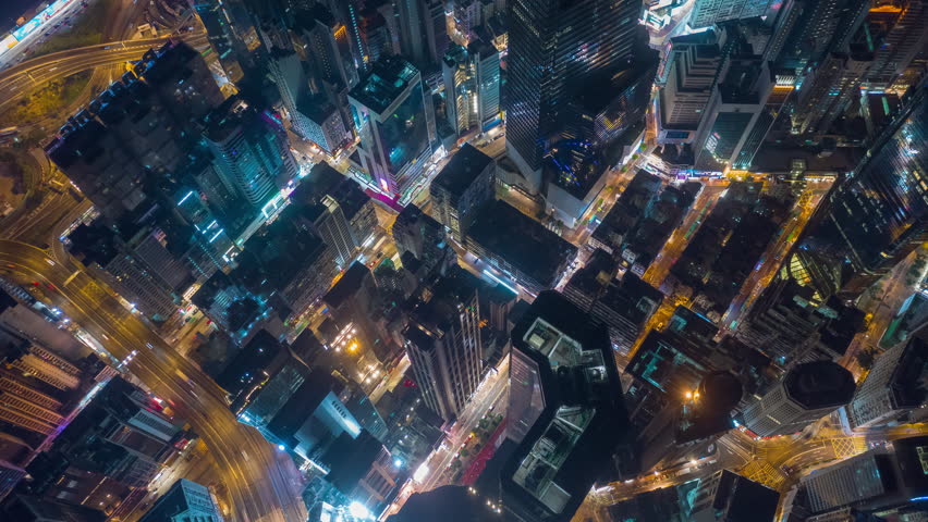 night illumination flight over hong kong city downtown traffic aerial topdown panorama 4k timelapse