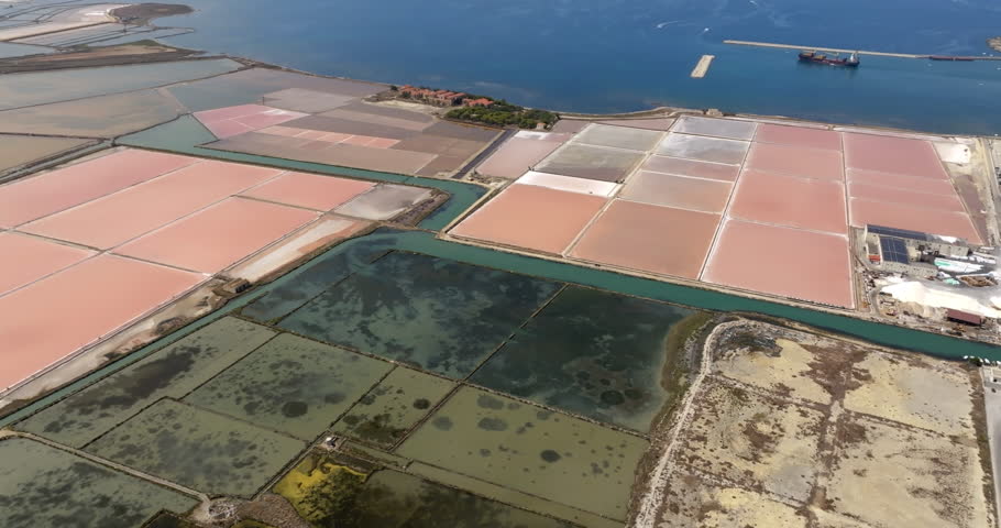 Aerial view of the Trapani salt pans, Sicily, Italy. Panorama of salt evaporation ponds.