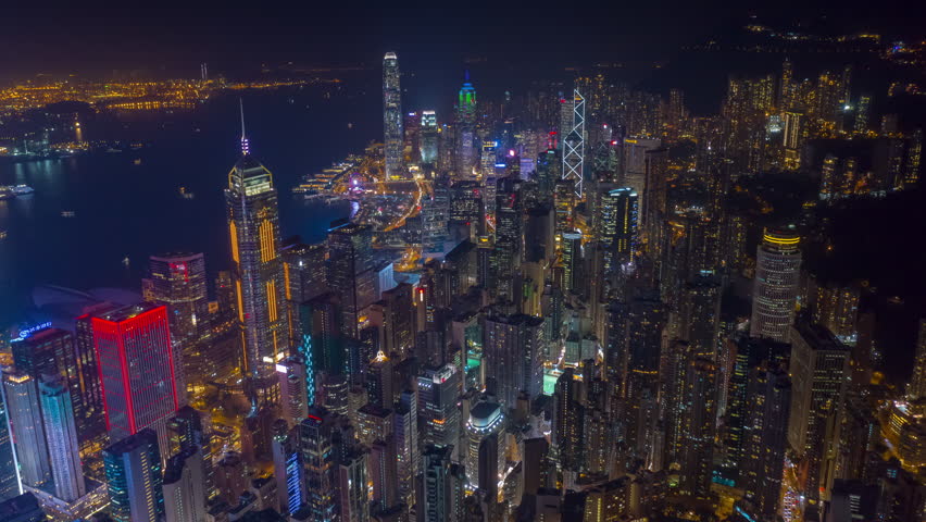 night illumination flight over hong kong city downtown aerial panorama 4k timelapse