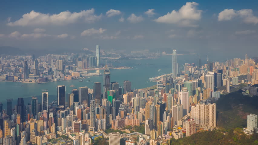 sunny day flight over hong kong city downtown victoria harbor aerial panorama 4k timelapse