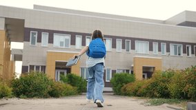 child kid girl runs book hands class, child kid girl run school backpack against background school, little girl daughter runs across school yard education building, energetic child happy schoolboy - Powered by Shutterstock - Get 15% off with code: PIKWIZARD15