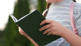 girl schoolgirl kid child reading book park, close-up face book, girl schoolgirl kid child reading interesting story school book, educational information young children, historical facts, girl - Powered by Shutterstock - Get 15% off with code: PIKWIZARD15