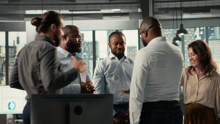 Company employees uniting hands and cheering their group success, project planning and data analytics. Colleagues focus on documentation and resource allocation to achieve progress. Camera B. - Powered by Shutterstock - Get 15% off with code: PIKWIZARD15