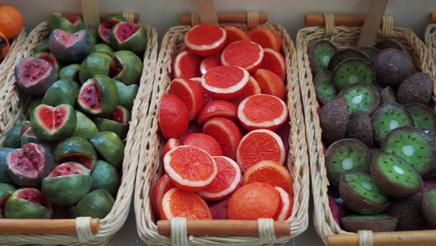 Colorful Fruit-Shaped Candies in Baskets 4k
