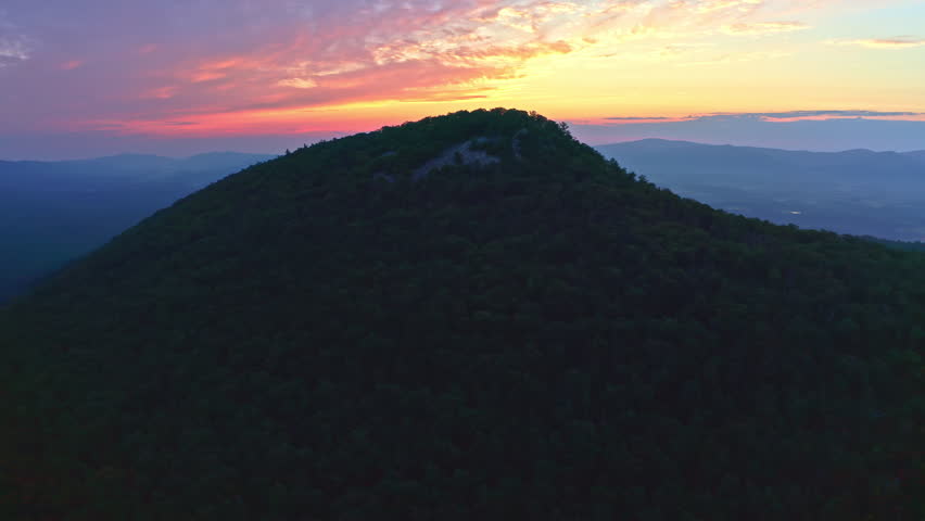 Aerial drone shot captures a colorful sunrise from Duncan Knob in Virginia