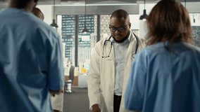 Professional physicians and medics gathered for a planning conference. The group discusses healthcare advancements, laboratory research and treatment methods to enhance medical care. Camera B. - Powered by Shutterstock - Get 15% off with code: PIKWIZARD15