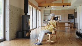 Senior woman reading in the room - Powered by Shutterstock - Get 15% off with code: PIKWIZARD15