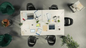 Top down view zoom in of company staff engaged in a corporate event for business partnership, coworkers analyze targets and proposals, planning forecasts with stakeholders for investment. Camera A. - Powered by Shutterstock - Get 15% off with code: PIKWIZARD15