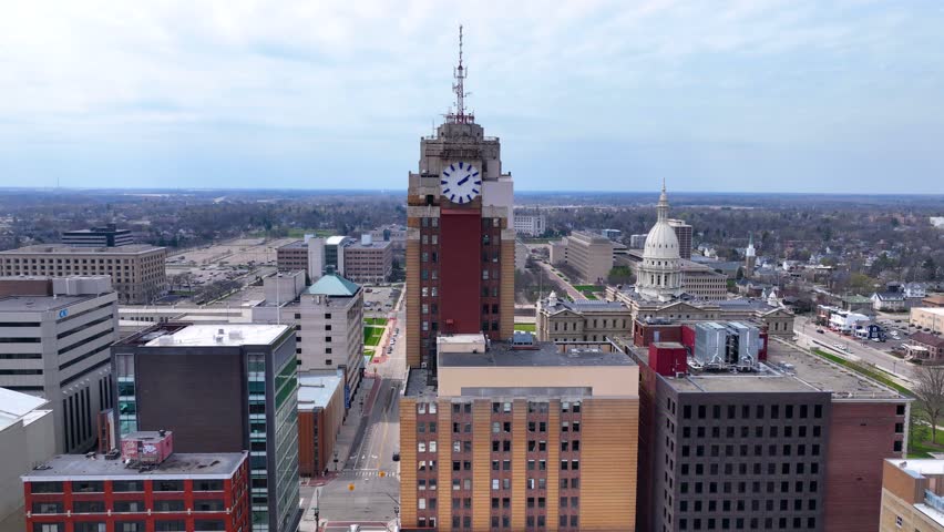 Michigan State Capitol aerial view at the end of Michigan Avenue with Boji Tower, Lansing, Michigan MI, USA. 