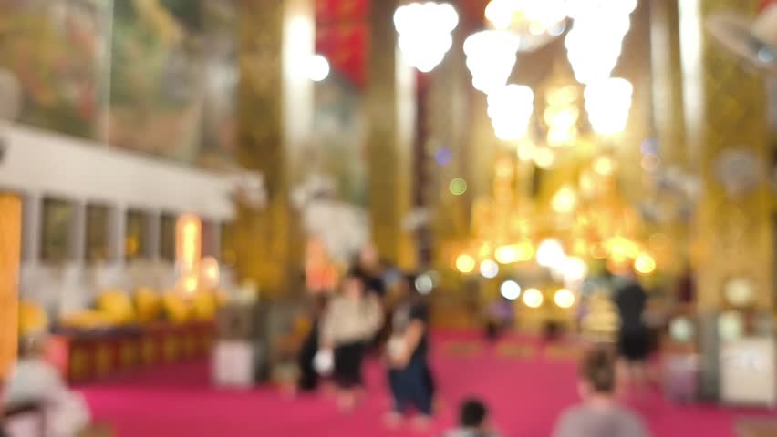 Blurred people in Thai temple, Lumphun province Thailand.
