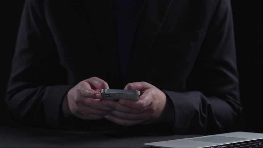 A visual representation of global communication featuring hands using a smartphone with various languages displayed around a digital globe, emphasizing connectivity and technology. Qubit - Powered by Shutterstock - Get 15% off with code: PIKWIZARD15