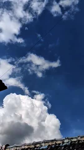 a cloud formation in the very hot afternoon