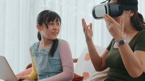 Granddaughter control laptop guide grandmother to dive in metaverse with VR. Senior adapt to technology activity communicate new generation kid cross generation gap strengthen family bond. Divergence. - Powered by Shutterstock - Get 15% off with code: PIKWIZARD15