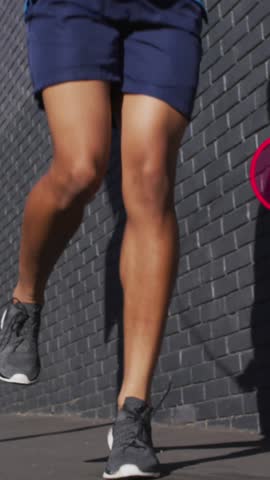 Animation of media icons over african american man jumping rope. Global business and digital interface concept digitally generated video.