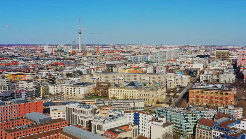 Aerial view of the Berlin TV Tower and buildings, showing the city