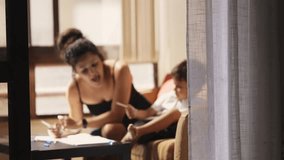 Mother helping son drawing at home - Powered by Shutterstock - Get 15% off with code: PIKWIZARD15