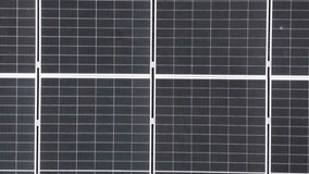 Aerial view of residential solar panels on house rooftop.Vertical video - Powered by Shutterstock - Get 15% off with code: PIKWIZARD15