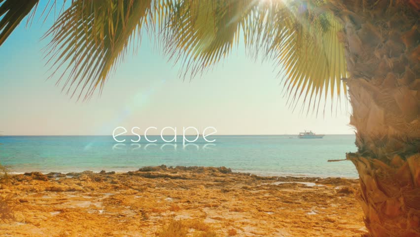 Seeking an ESCAPE? This evocative tropical scene features the word reflecting on the water. A perfect visual metaphor for freedom, adventure, and disconnecting from everyday life.