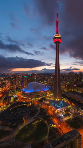 Day to night timelapse of Downtown Toronto in Ontario, Canada, zooming out. 
