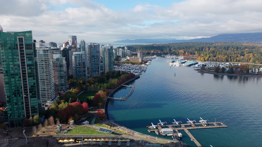 Rising Aerial of Downtown Vancouver and Stanley Park on a Sunny Autumn Afternoon