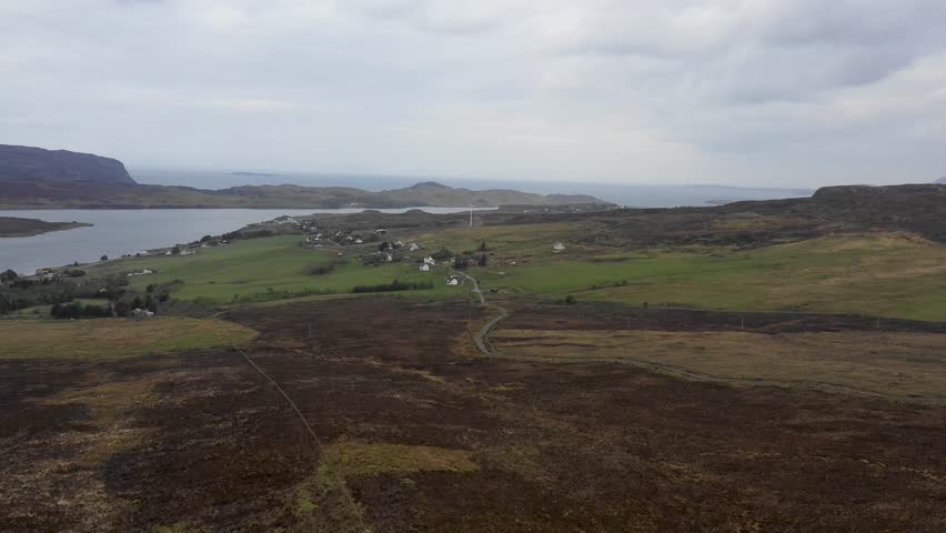 Wind farm in Scotland with turbines for electrical energy generation - Wind farm, power station for clean energy production from wind - Renewable energy and environment concepts