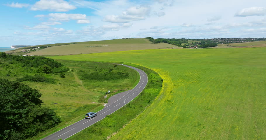 Scenic Country Road To The Seven Sisters Cliffs In East Sussex, England. Aerial Drone Shot